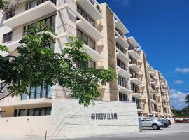 Depa Isla del Amor con alberca, y acceso al río y la playa，Conchal的飯店