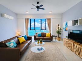 Family Friendly 3BR Seaview High Floor Suite for 10 Bathtub N Sauna Near Gurney Jazz Suites, hotell med bubbelbad i Tanjong Tokong