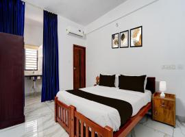 Collection O Rajagiri Hospital Aluva East، فندق في Alwaye