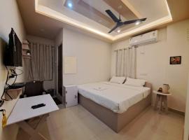 Vijaya Lodge, hotel en Vadalūr