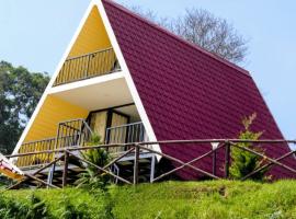 Cloudy Nandy Hills Poombarai, Hotel in Kūkkāl