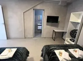 #115 Suíte cama casal e solteiro c/ vaga - Centro