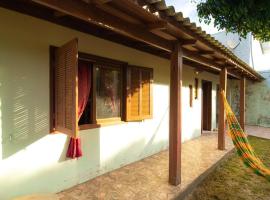 Casa na praia - 2 quartos - Garagem - Churrasqueira -Imara IMBÉ, hotel em Imbé