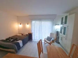 Appartement T2 4p idéalement placé Port, 150m plage du Nau, commerces