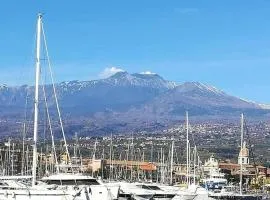 Magic Etna and glamorous blue sea