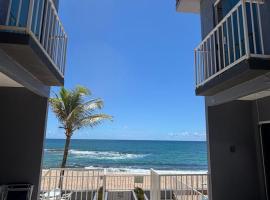 Village em Arembepe - Brisas de Arembepe Pé na Areia e Pertinho da Praça, hotel a Arembepe