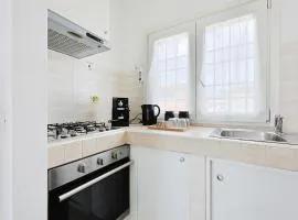 Azure Oasis with parking near the airport & beach