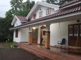 Stoa Dream Home, hotel i Erāttupetta