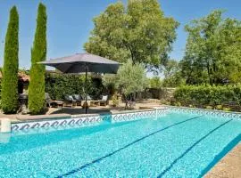 Stone House Within Castle Ramparts In Goult