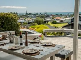 Relax and rewind at Waihi Beach with Oberon Bach