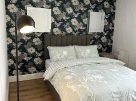 Double bed room like a hotel room with share toilet