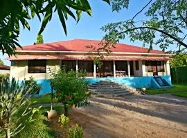 Pangani Beach House se snídaní