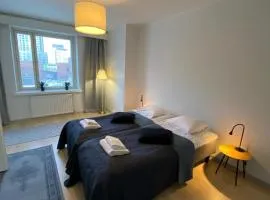 Kotimaailma Apartments - Keskustakolmio