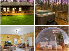 Cabin with King Bed , XBOX, HotTub, Games, Firepit , Stargazing Dome, Hotel in Logan