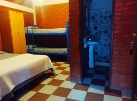 Habitación con baño privado en el corazón de Nono, хотел в Ноно