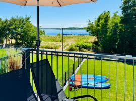 8 Personen Ferienhaus ,,Seegelblick" am Goitzschesee, erste Reihe am Strand mit Sauna, Whirlpool, Kamin, Wallbox & SUP, hotel em Pouch