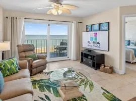 Direct oceanfront 2/2 condo with a private balcony, heated beachfront pool, and garage