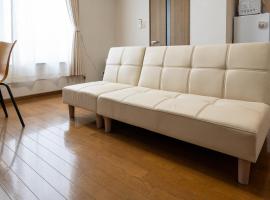 Furano Farm Tomita Condo, hotel a Furano