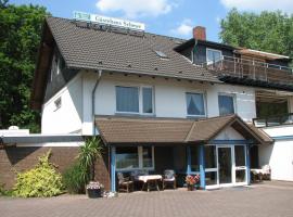 Gästehaus Schewe, hotel que admite mascotas en Ahnsen