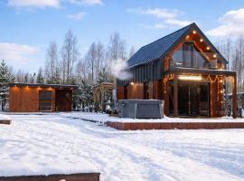 Domek nad Jeziorkiem Sauna -Silownia-Balia, hôtel à Waliska