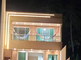 De frente para o mar com a comodidade de acesso as 5 suites climatizadas todas no Terreo โรงแรมในอิคาปุย