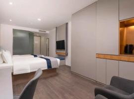 Philosopher Hotel (Suzhou Wuzhong Shopping Mall, Shihu East Road Subway Station Store), hôtel à Changshu