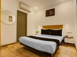 Super Townhouse Mumfordganj Fountain Crossing Formerly APS Inn