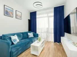Blue and Beige Apartment in Sianożęty with Seasonal Pool, Parking and Balcony by Noclegi Renters