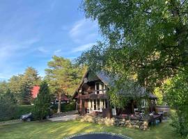 Cozy loghouse with sauna near a great sandy beach, hotel v destinácii Syytme
