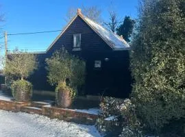 Converted barn stay in idyllic village location