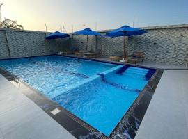 Zan Suites Hotel & Apartment, hotel din Kinyasini