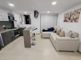 Apartamento moderno frente a la Universidad Santo Tomás WiFi y parqueadero