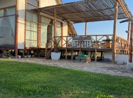 Refugio 55 Casa de Playa en Chincha, Frente al mar, rumah kotej di Chincha Baja