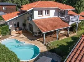 Villa moderne à Biscarrosse - 5 chambres, piscine chauffée, proche lac, piste cyclable - FR-1-319-625