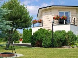 Dom za Tujami, hotel in Strykowo