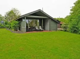 Blockhaus mit grosser überdachter Terrasse
