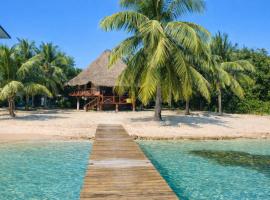 Kin Resort Lodge, hotel que aceita pets em Maya Beach