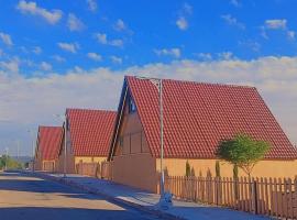 منتجع وأكواخ غصن, hotel i Khirbat Sin‘ār