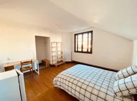 Chambre privative dans maison partagée avec d'autres voyageurs