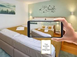 Stadtdomizil Ziegelfeld - Ruhig & Zentral, 65" TV, Südbalkon, vollausgestattete Küche, Altstadt fußläufig, Bahnhof 5-10 Min, Tiefgarage im Haus,