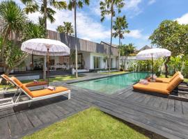Villa Ikebana - Trendy 5BR Spacious Villa with Rice Field Views, Large Pool, and 5 Minutes to Canggu, Hotel in Kerobokan