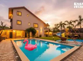 StayVista at Dusk by the Hills with Heated Pool