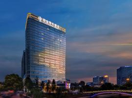 吉首湘泉阳光酒店، فندق في Jishounan Zhan