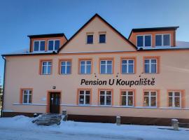 Pension U Koupaliště โรงแรมในติซา