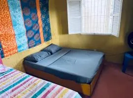 El Gringo Quarto privativo com banheiro compartilhado