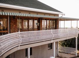 Kudu Kopje Lodge, casa de muntanya a Kroondal