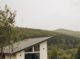 Гірські будиночки, hotel Szarvasházán