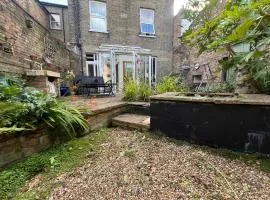 Central 3 BR Home with Private Courtyard