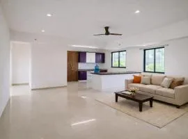 New Spacious 2BHK apartments in Tirupati Near Railway Station with fully equipped kitchen, AC bedrooms, Washing Machine, 24 hours water, caretaker service, and ample space for car parking & ideal for families and pilgrims