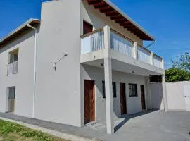 Casa de Praia nova com estacionamento 1